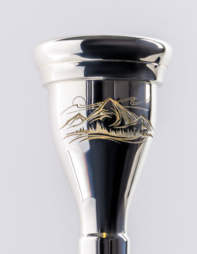 “Sunset on the Mountains” Mouthpiece Engraving Suitable for Orval and trombone pieces. The cost is $55, $65 for trombone.
