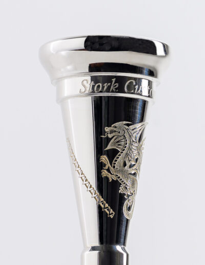 “Dragon” Mouthpiece Engraving This design is suitable for all french horn models, all trombone models and for trumpet shanks (without the bars). The cost is $40.00 With the tribal bars (not available for trumpets, cornets of flugelhorn pieces) $50.00
